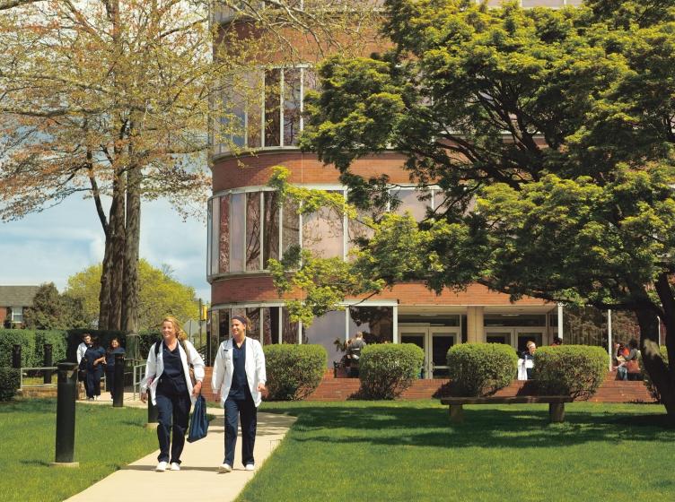 Nurses walking through campus